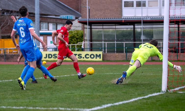 Mike Wilde makes no mistake for his sides second to secure the points for the Nomads